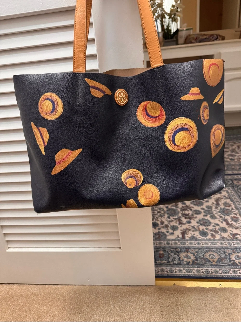 Tory Burch Black Leather Tote with Yellow Hat Motif